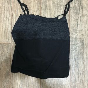 A thin strapped lace baby tee